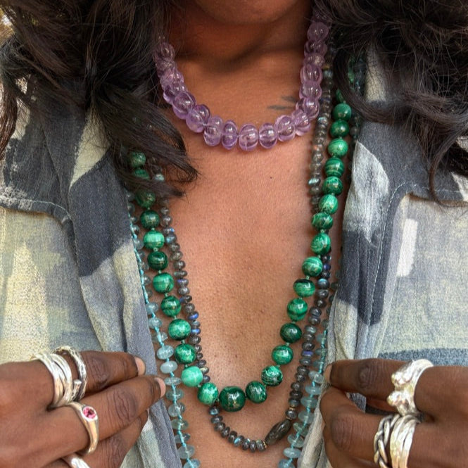 Graduated Strand Of Malachite Beads.