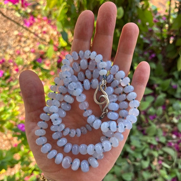 Long Strand of Chalcedony Beads.
