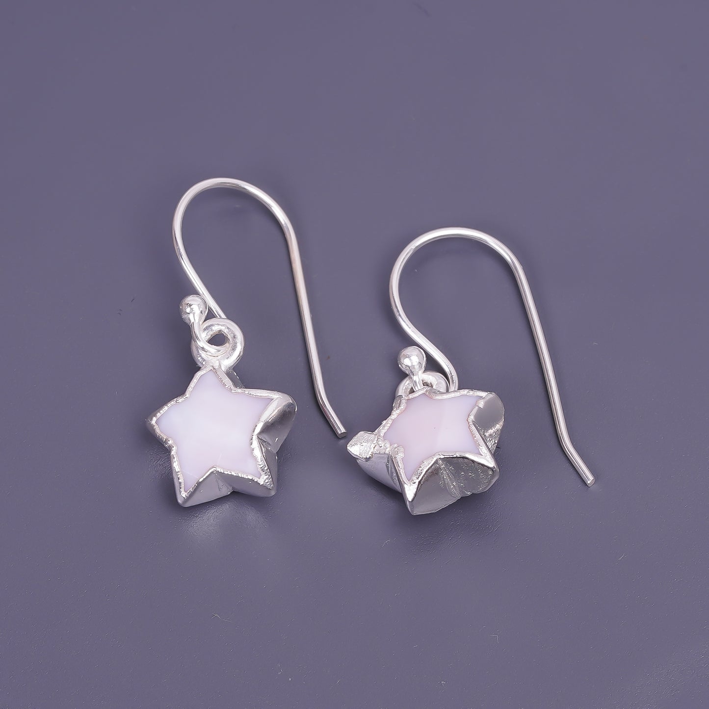 unisex star shaped pink opal earings